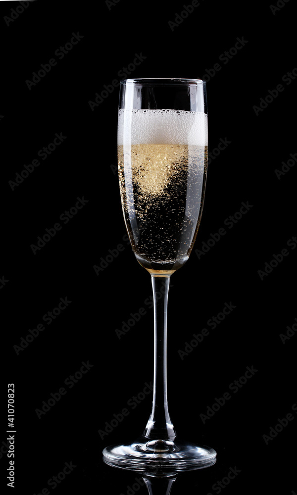 glass of champagne on black background glass of champagne on black background