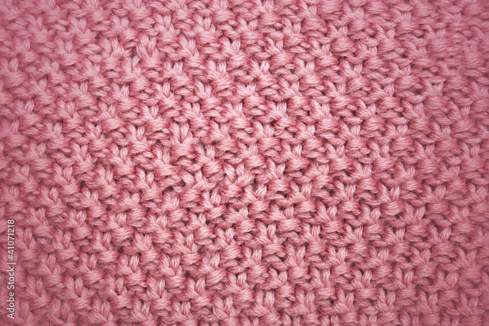 Pink knitted background Pink knitted background