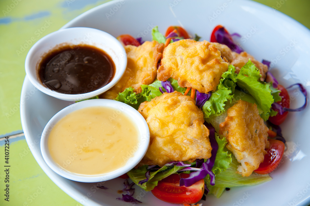 Delicious salad with fish, vegetable and dipping sauce Delicious salad with fish, vegetable and dipping sauce