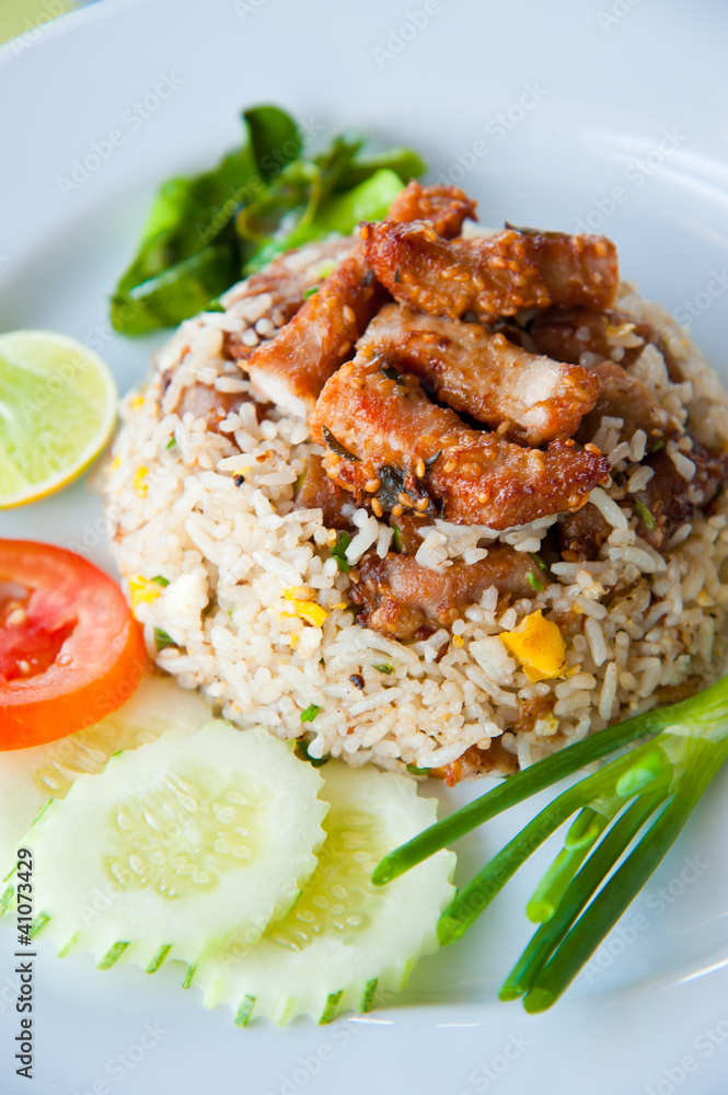 delicious fried rice with deep fried pork and vegetable delicious fried rice with deep fried pork and vegetable