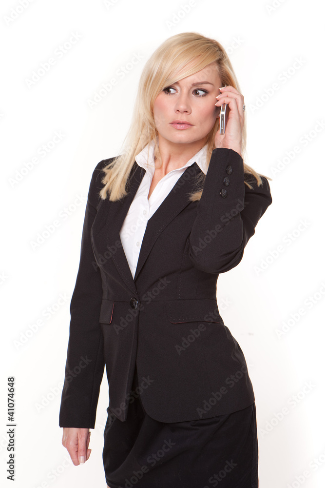Blonde businesswoman chatting on her mobile Blonde businesswoman chatting on her mobile