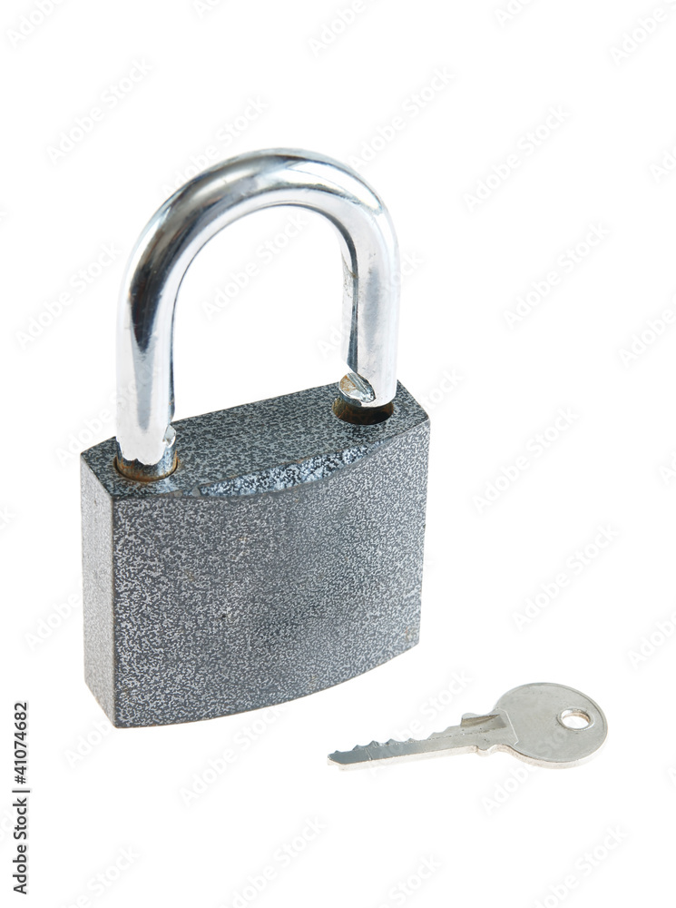 Padlock with a key isolated over white background Padlock with a key isolated over white background