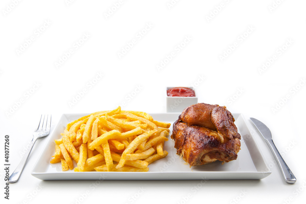 Halbes Hähnchen mit Pommes StockFoto Adobe Stock