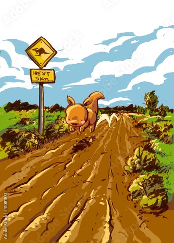 canguro saltando por un camino en australia photo