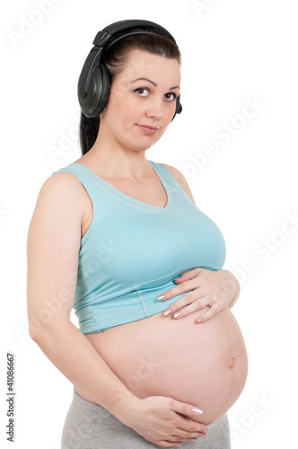 Pregnant belly with headphones