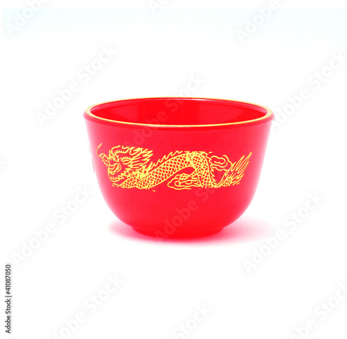 Gold gragon on red cup photo