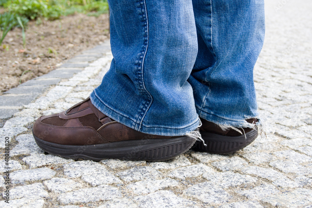Special Sneakers for walking and ripped jeans.