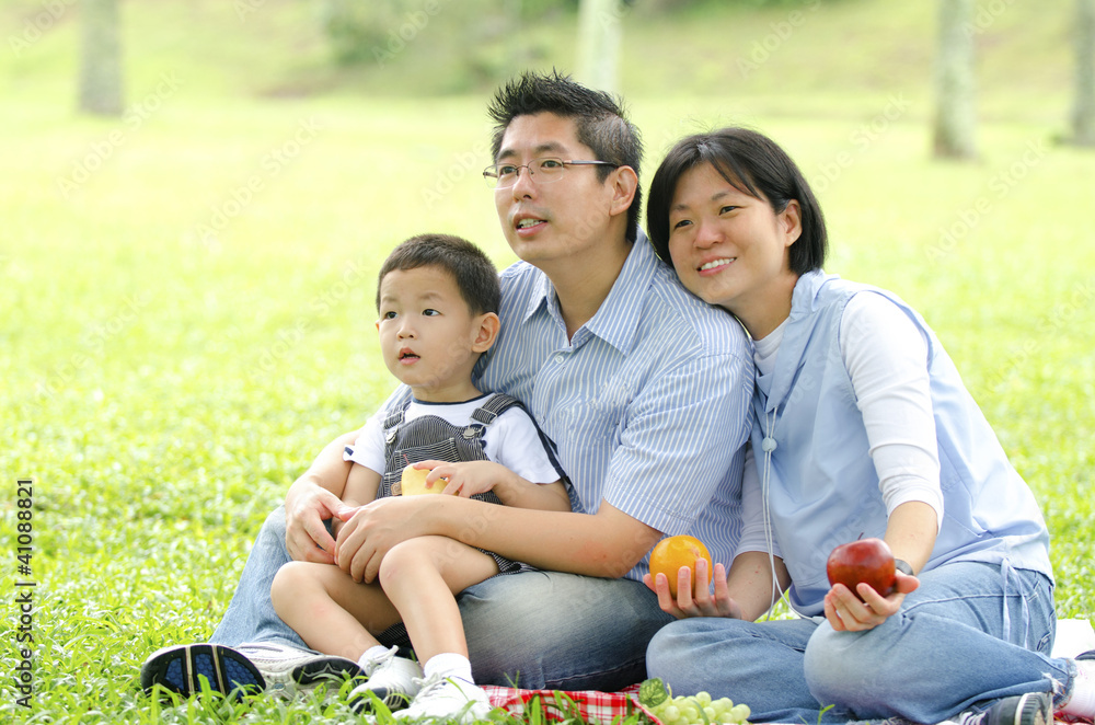 asian family having a picnic during outdoor ,focus on baby asian family having a picnic during outdoor ,focus on baby