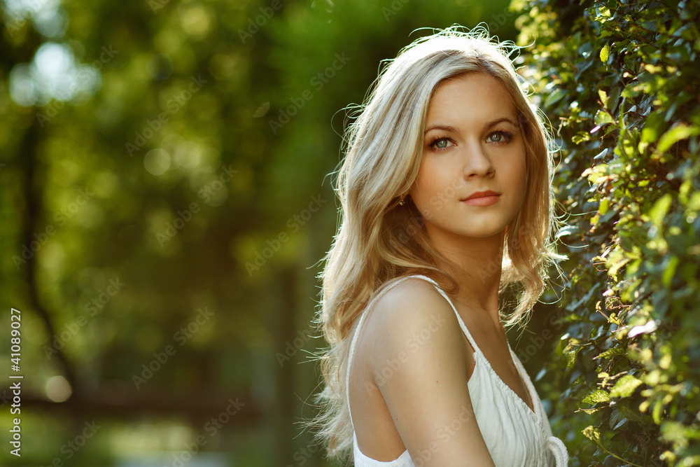 Naklejka premium Beautiful Blond Girl With Trees, White Dress