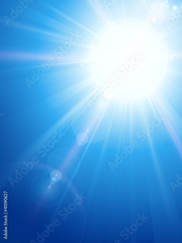 Blue sky with sun and lens flare