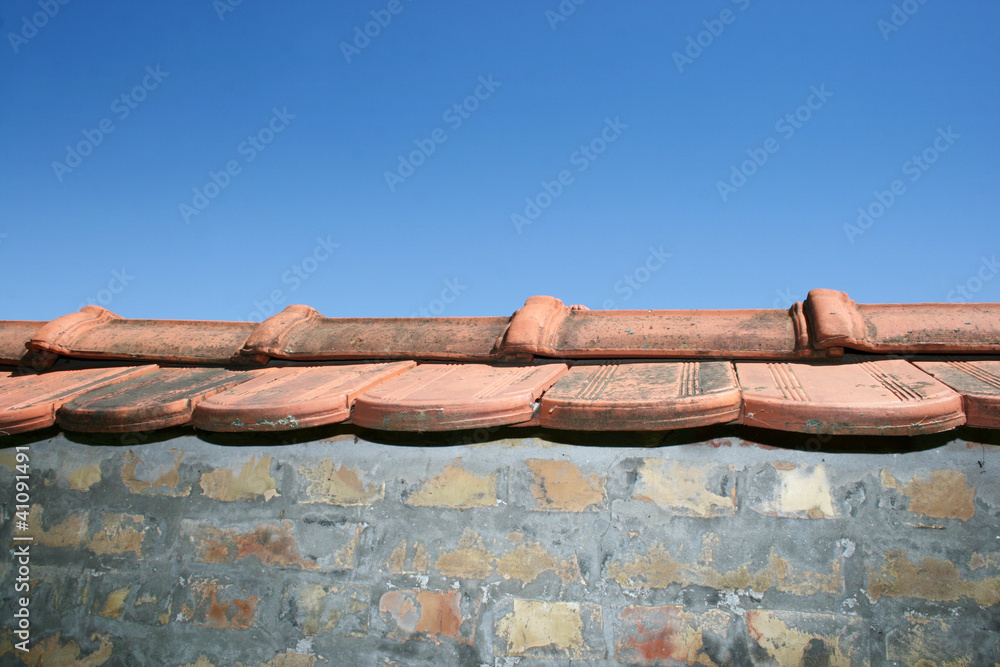 wall with roof tiles