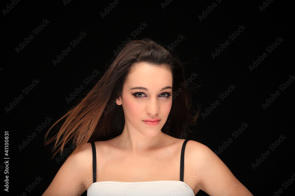 beautiful young girl on a black background