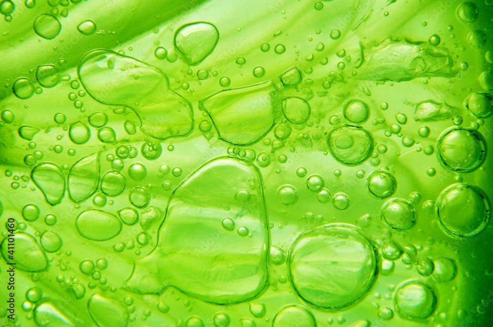 Lime with bubbles on white