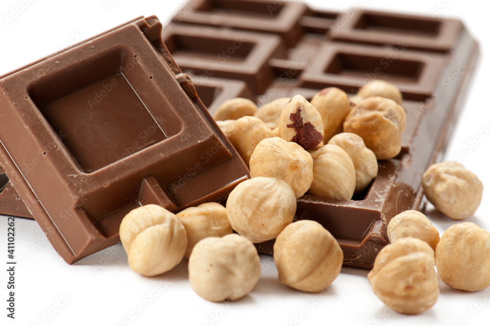 chocolate bar with nuts on white background chocolate bar with nuts on white background