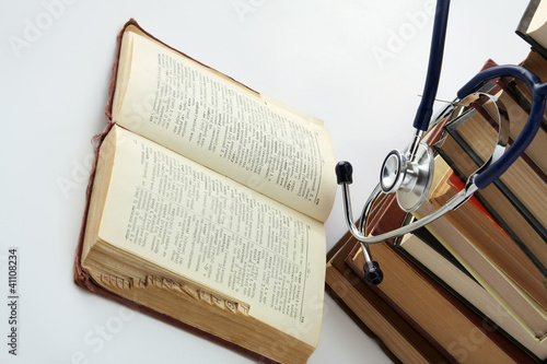 stethoscope on a pile of books