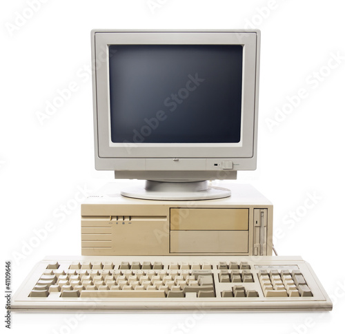 Old computer, keyboard CPU and monitor isolated on white