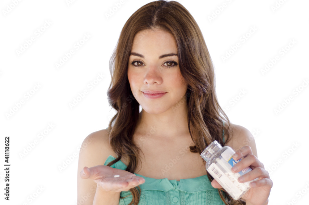 Beautiful woman about to take an aspirin Beautiful woman about to take an aspirin