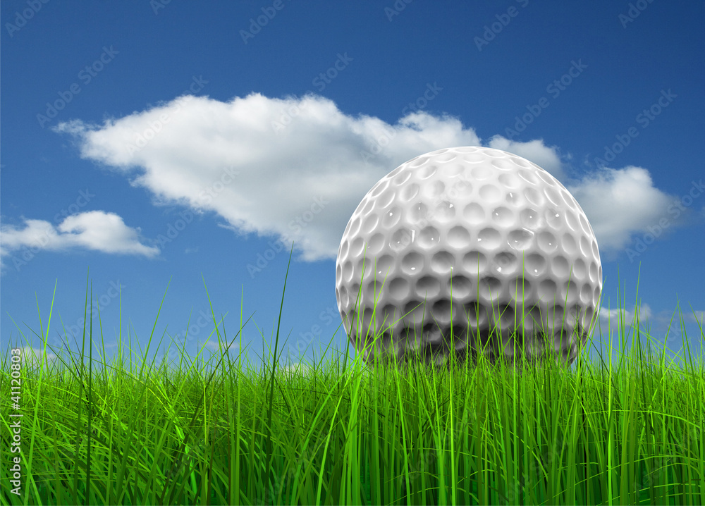 Conceptual golf ball in grass over a blue sky Conceptual golf ball in grass over a blue sky