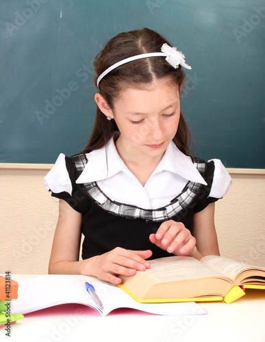 little schoolchild in class...