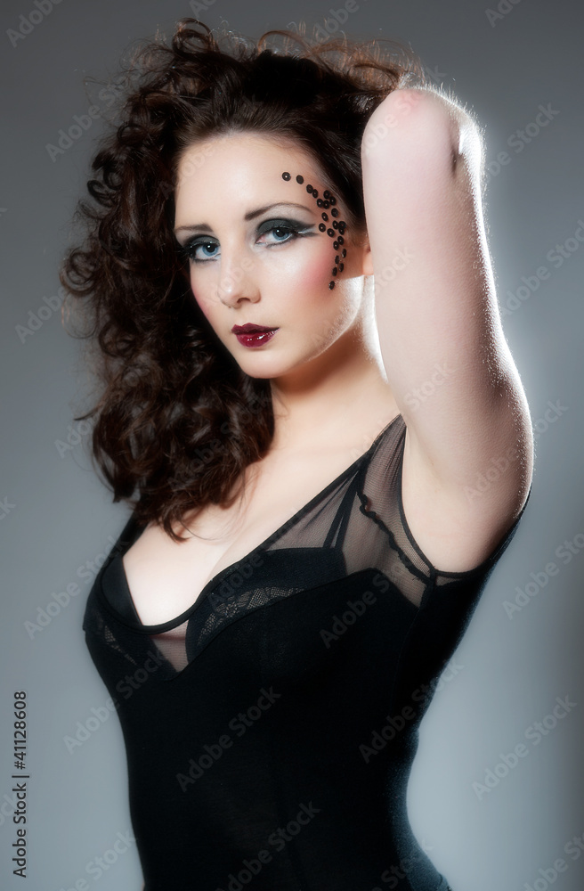 Pretty young female in black with beautiful make up Pretty young female in black with beautiful make up