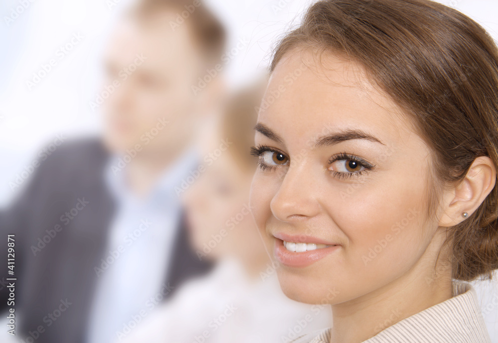 Closeup of a smiling young business executive Closeup of a smiling young business executive