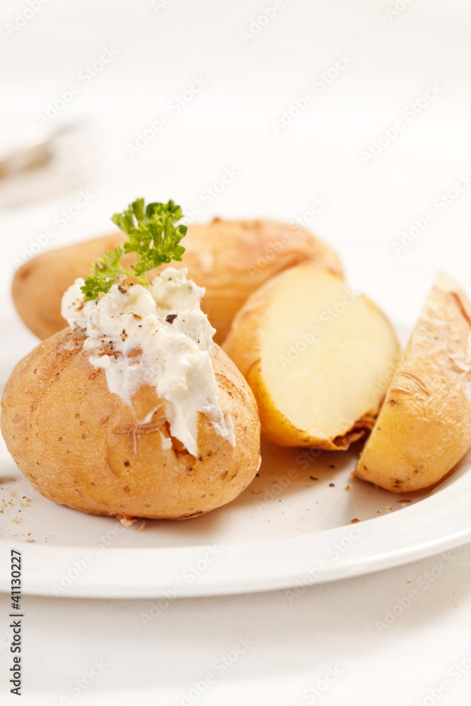 Baked potato filled with soft cheese Baked potato filled with soft cheese