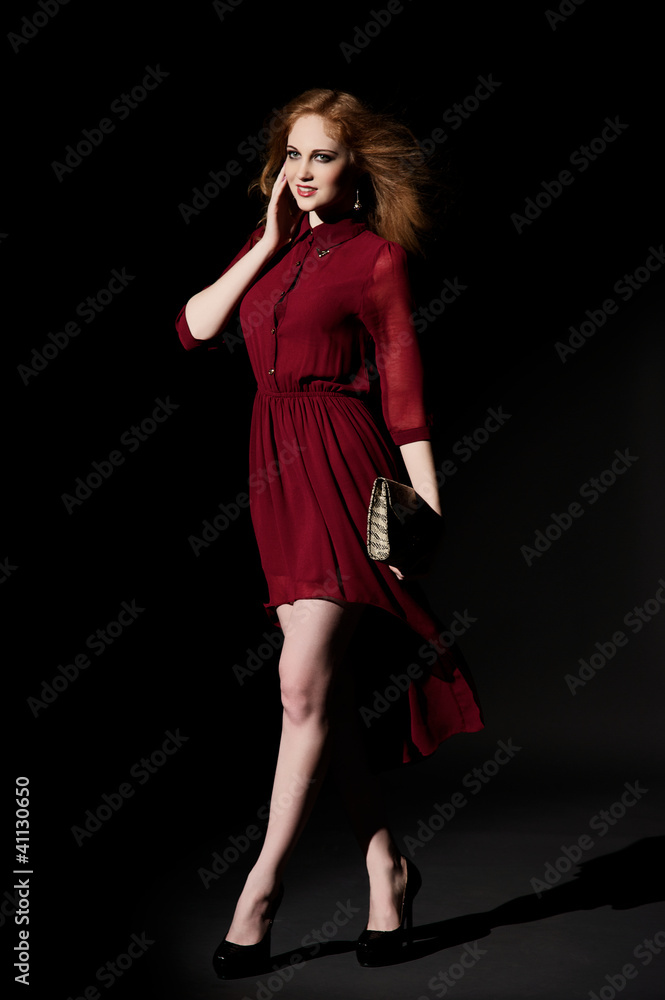 Holliwood style portrait of young beautiful girl wearing red dre Holliwood style portrait of young beautiful girl wearing red dre