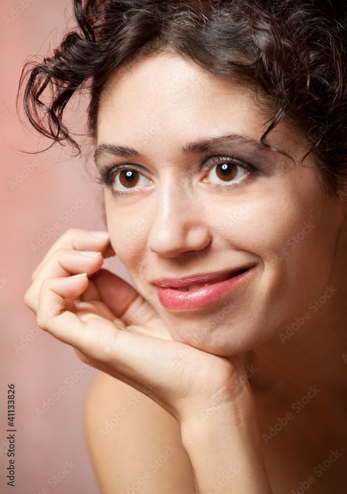 portrait of the young dark-haired girl in studio on color backgr portrait of the young dark-haired girl in studio on color backgr