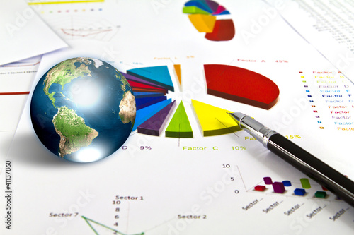 Pen and business graph with earth (Elements of this image furnis