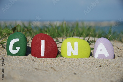 Gina, female name on colourful pebbles photo