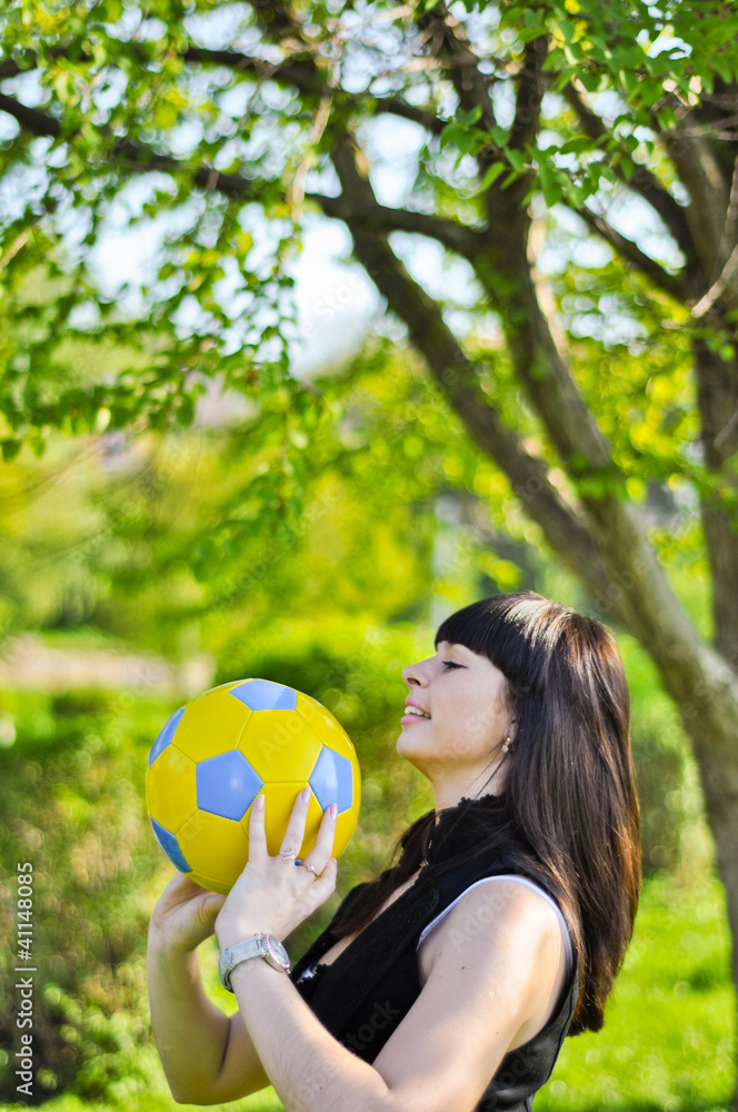 Beautiful Ukrainian girl with a ball inviting to Euro 2012 Beautiful Ukrainian girl with a ball inviting to Euro 2012