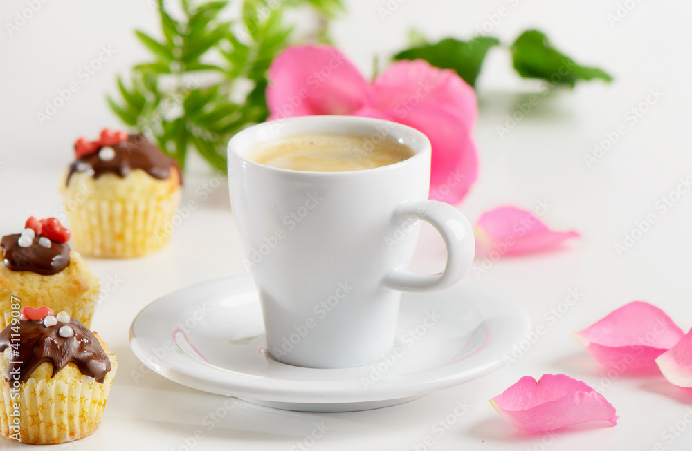 Coffee cup and muffins Coffee cup and muffins