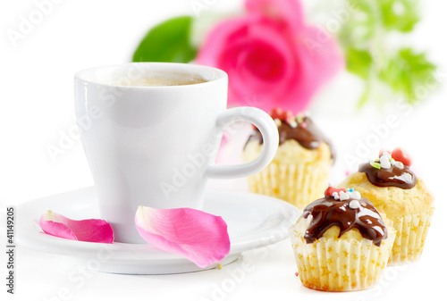 Coffee cup and muffins
