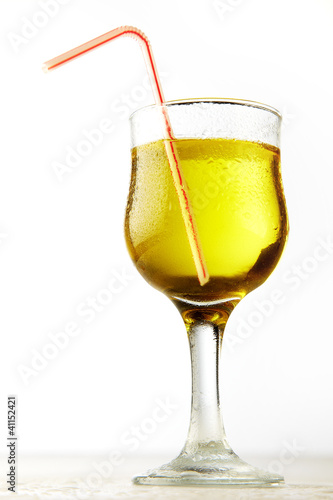 fresh Glass of apple juice isolated on white