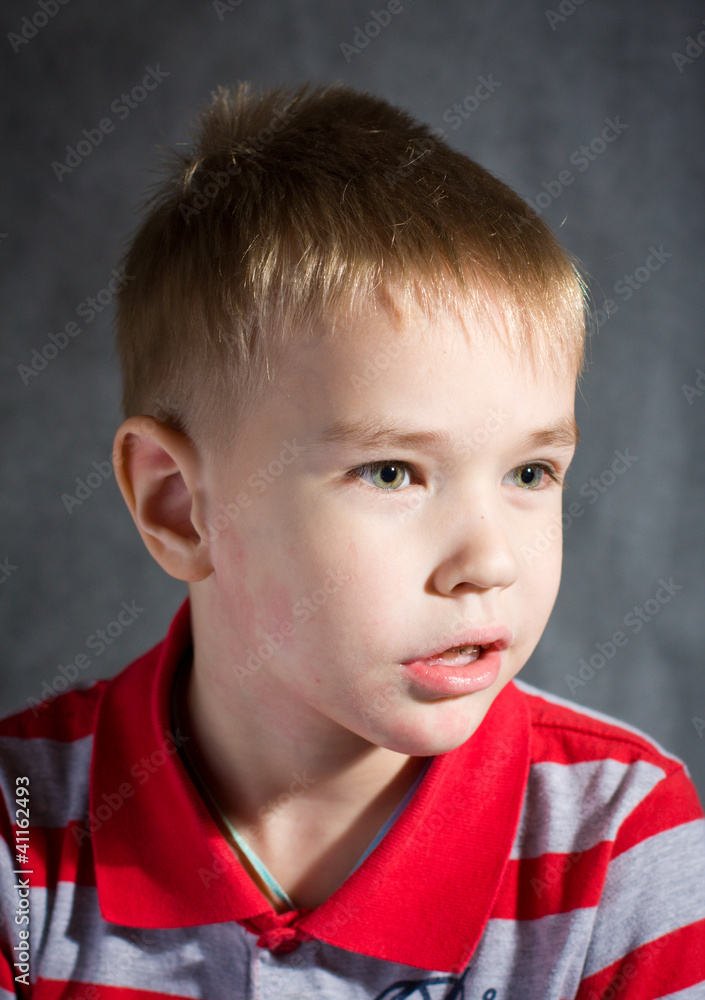 Portrait of the boy in a shit with ar collar Portrait of the boy in a shit with ar collar
