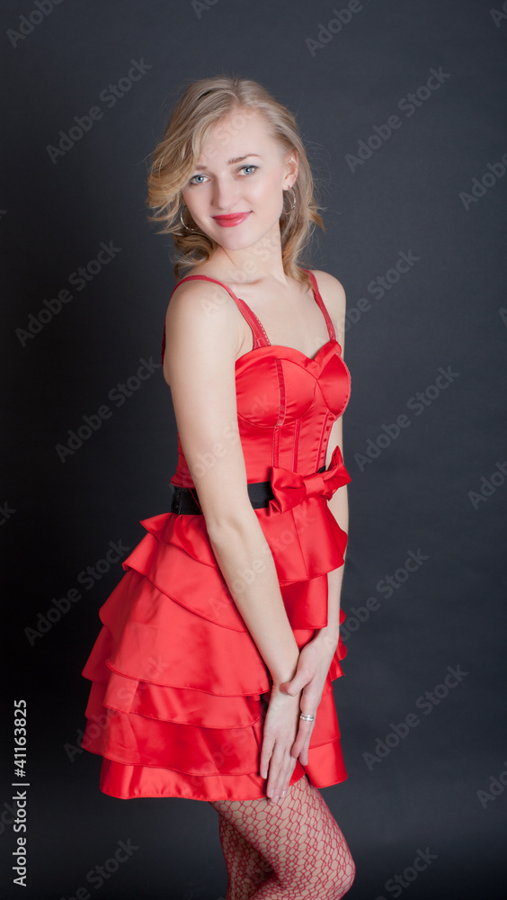 Fototapeta premium blonde in a red dress