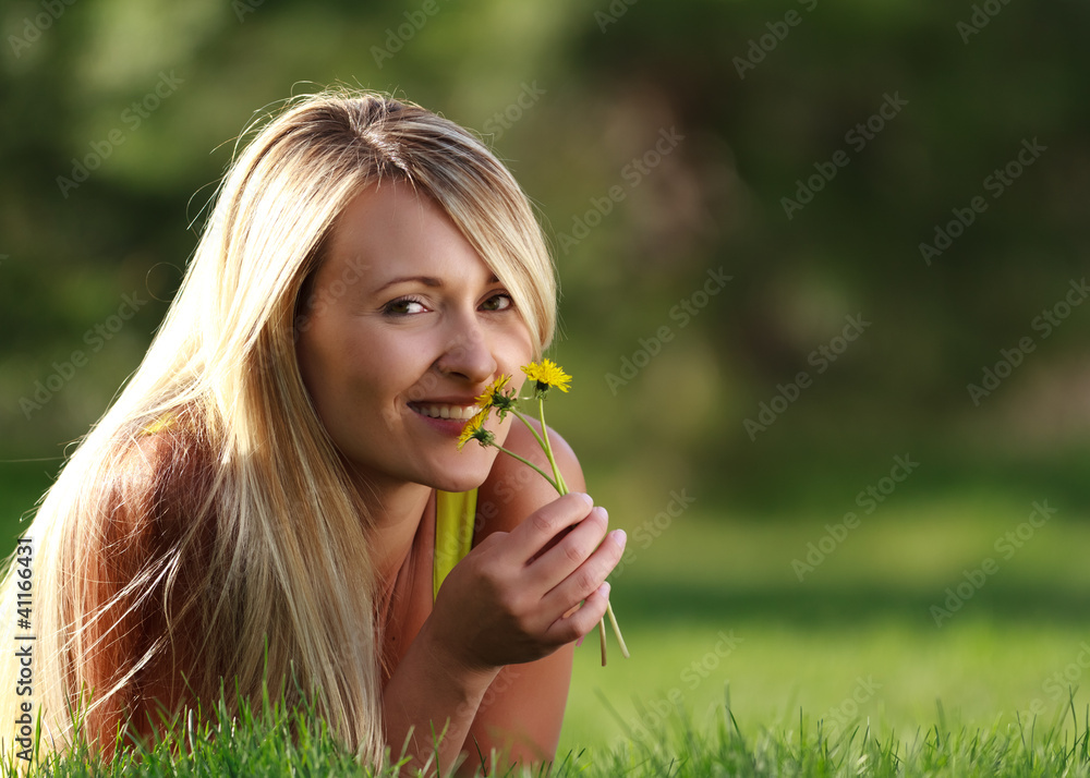 young attractive woman with flowers young attractive woman with flowers