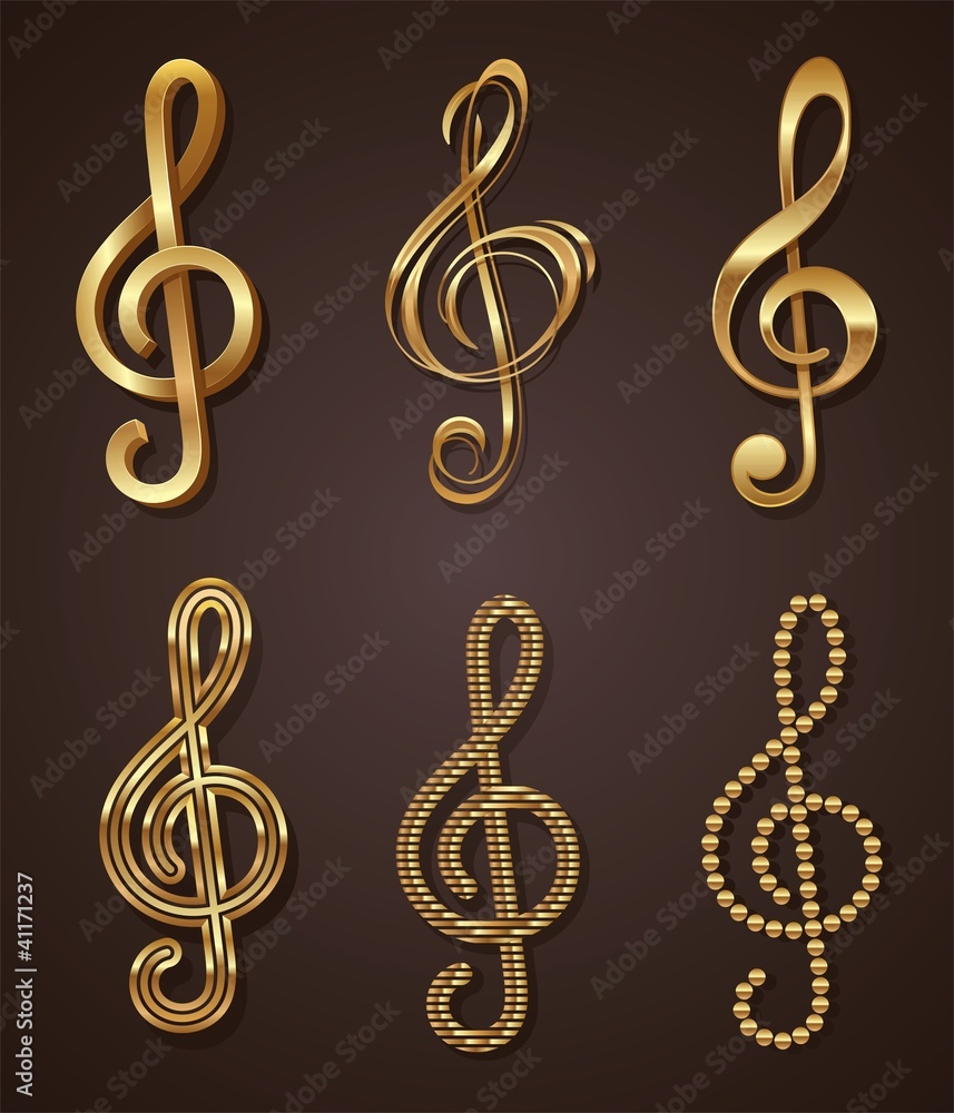 Obraz premium Vector set of golden decorative treble clef