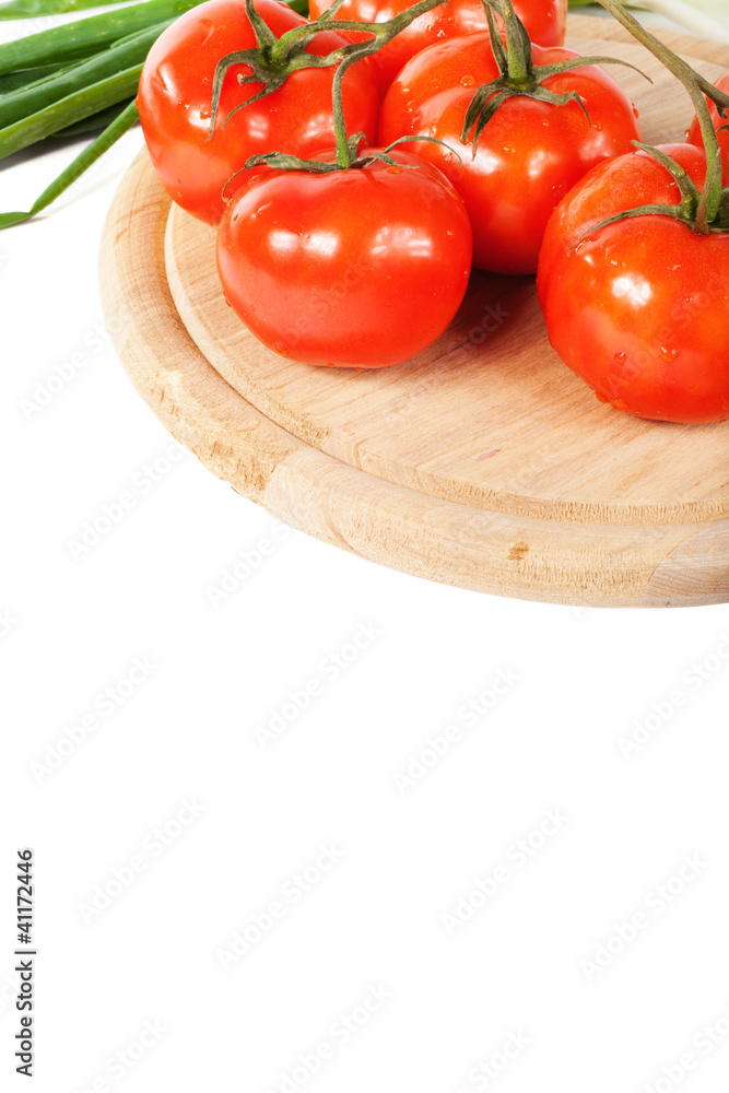Fresh tomatoes on a branch Fresh tomatoes on a branch