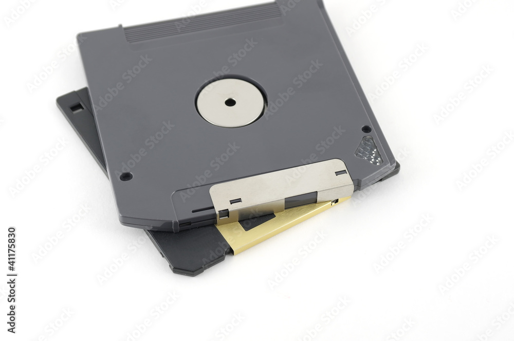ZIP and floppy disks over white ZIP and floppy disks over white