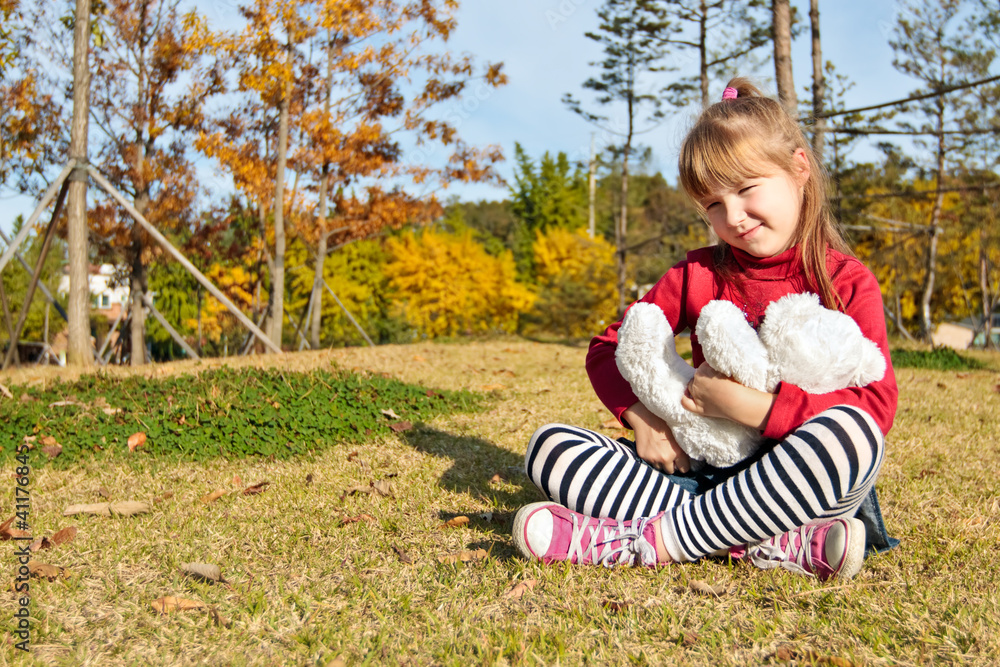 Little girl with the bear toy Little girl with the bear toy