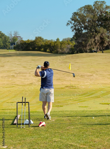Male Golfer at Driving Range