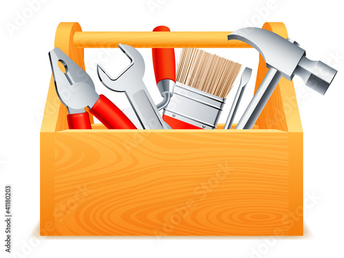 Wooden toolbox full of tools.