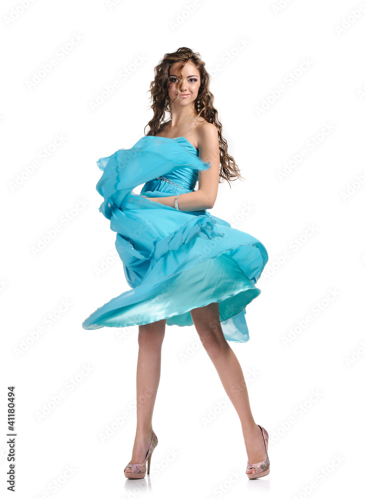 Photo of beautiful girl in the sky-blue dress isolated on white Photo of beautiful girl in the sky-blue dress isolated on white