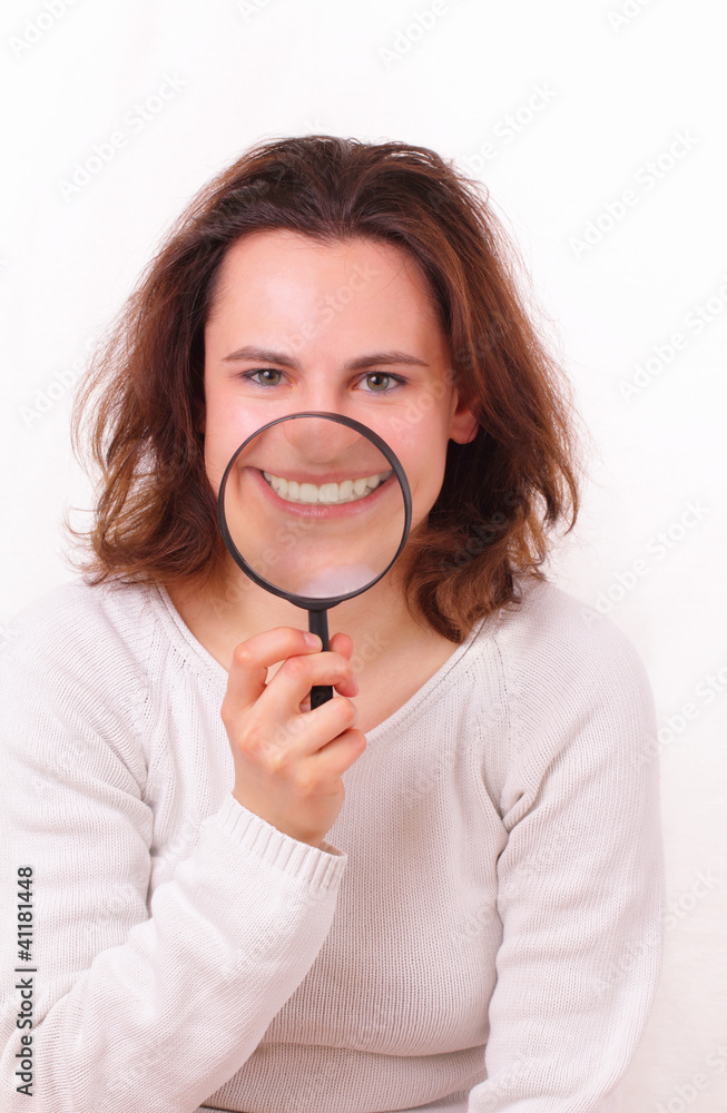 Beautiful and funny young girl shows her white teeth Beautiful and funny young girl shows her white teeth