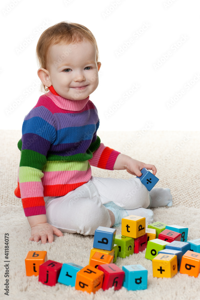 Redhead little girl with blocks Redhead little girl with blocks