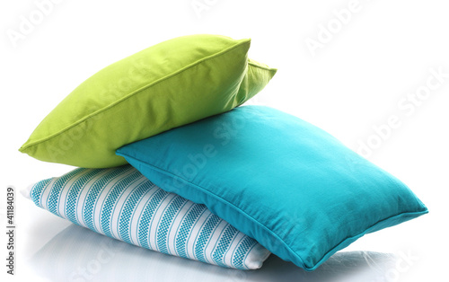 bright pillows isolated on white photo