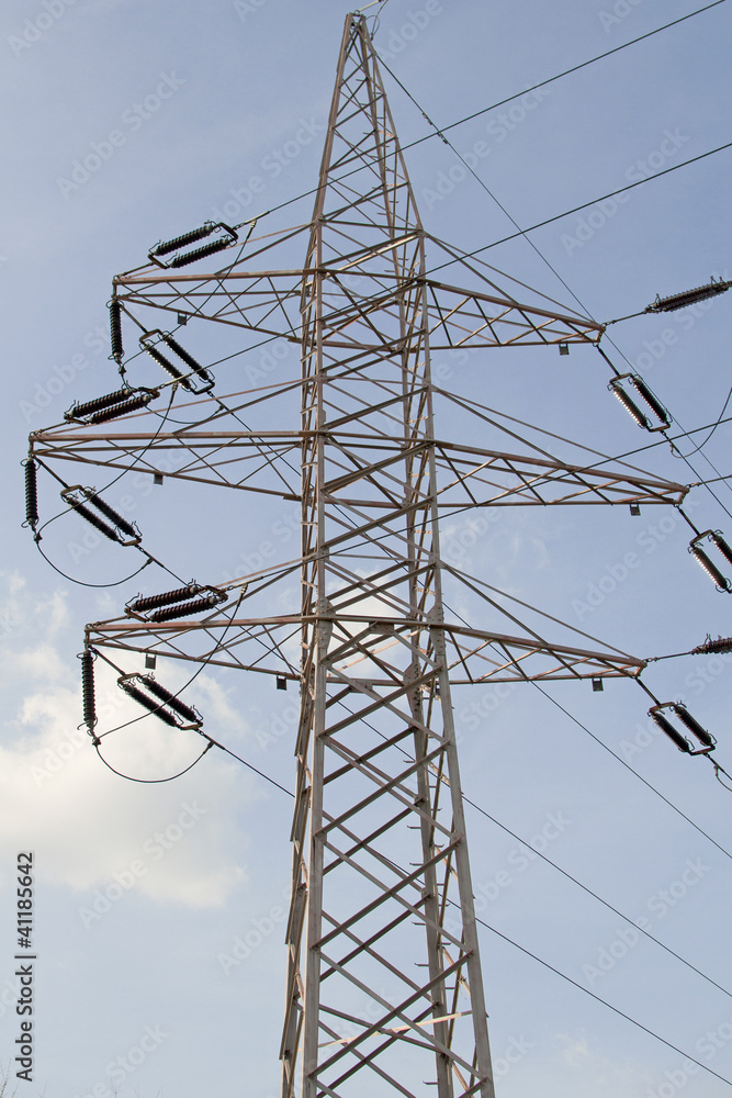Electric power lines on a blue sky background - obrazy, fototapety, plakaty 
