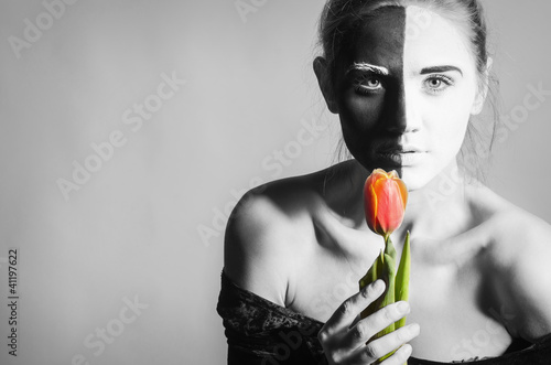 BnW Woman with dual greasepaint  and tulip photo