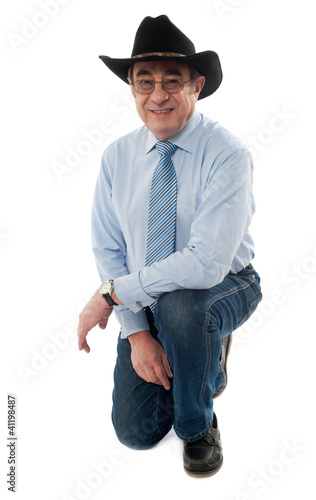 Smiling man wearing cowboy hat